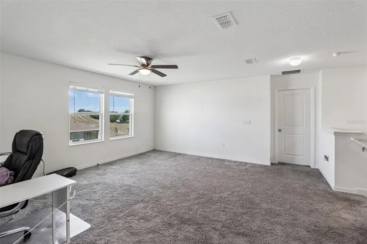 Large bonus/loft at the top of stairs.