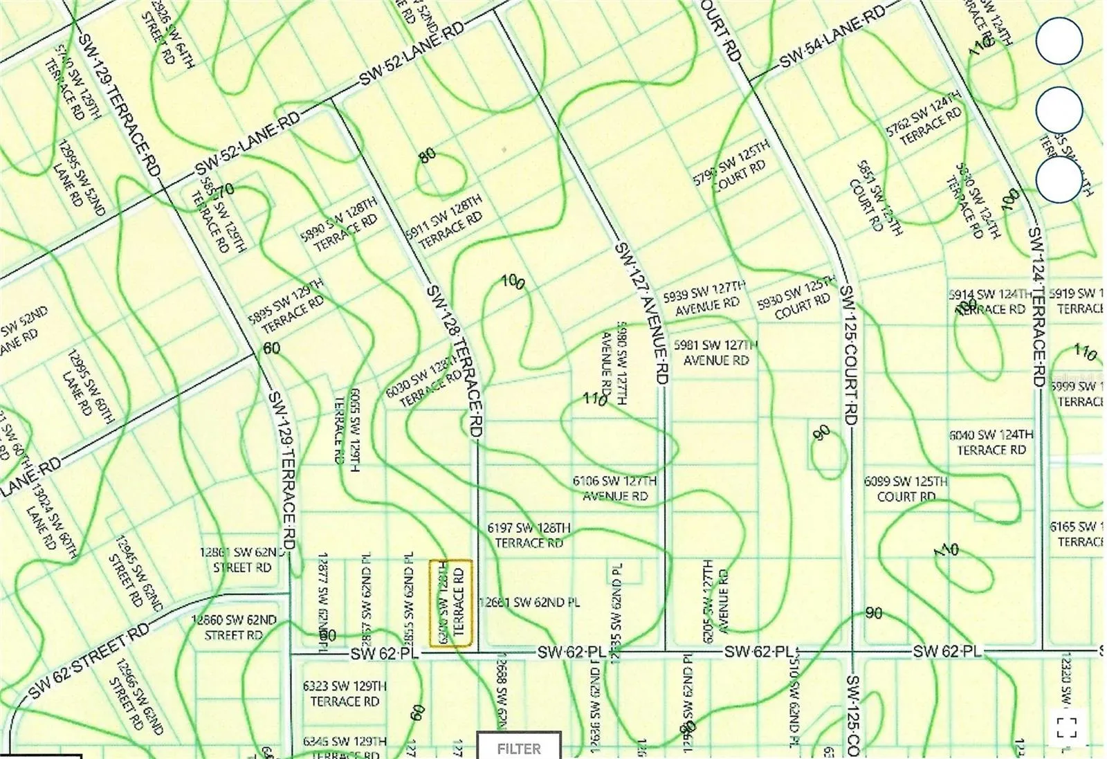 Corner of paved SW 62nd Pl and 128th Ter Rd dirt