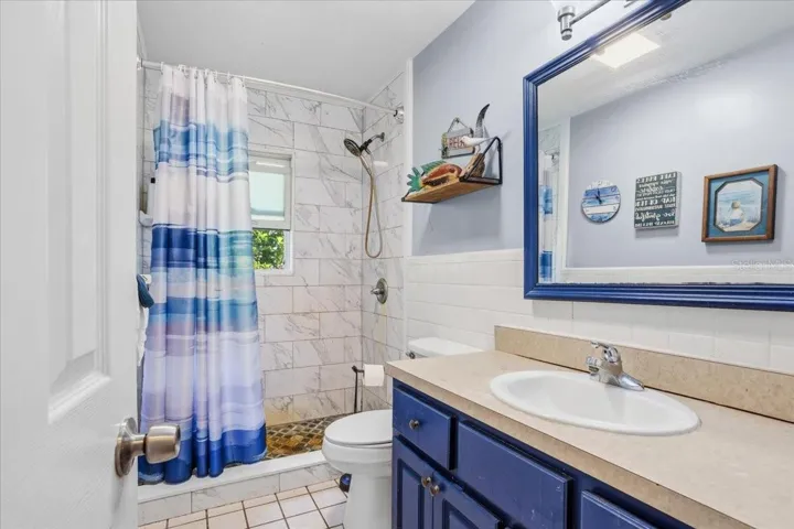 Guest bathroom conveniently located in the main living area and close to the 4th and 5th bedroom loaded with space to move around!