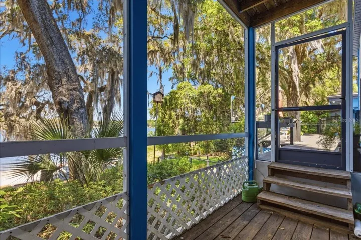 Guests and family will love this screened porch off the bedroom!