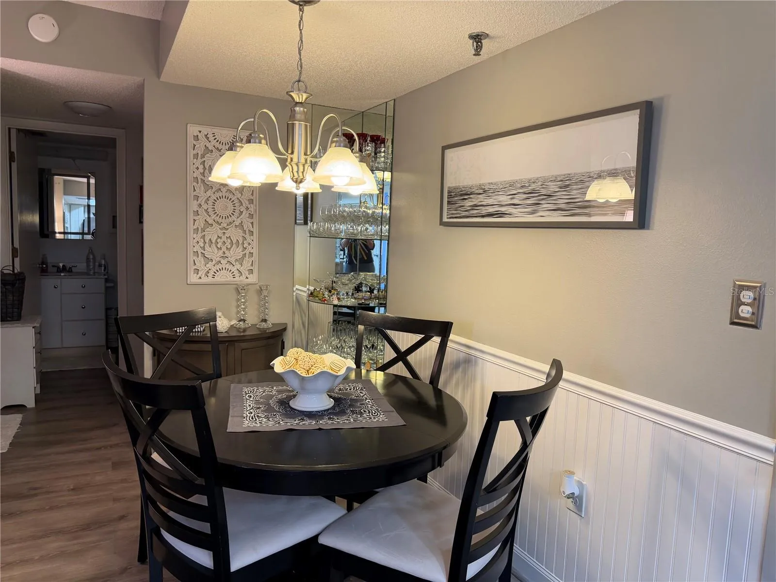 View of Dining Table / Entry Custom Glass Shelving