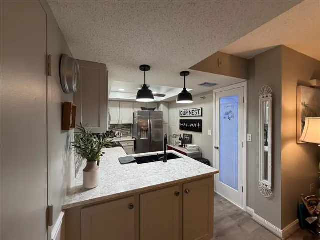 View From Entrance of Your New Home Showing Off Your Beautiful Newly Remodeled Kitchen