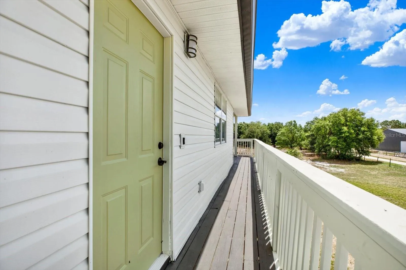 Front door at top of staircase