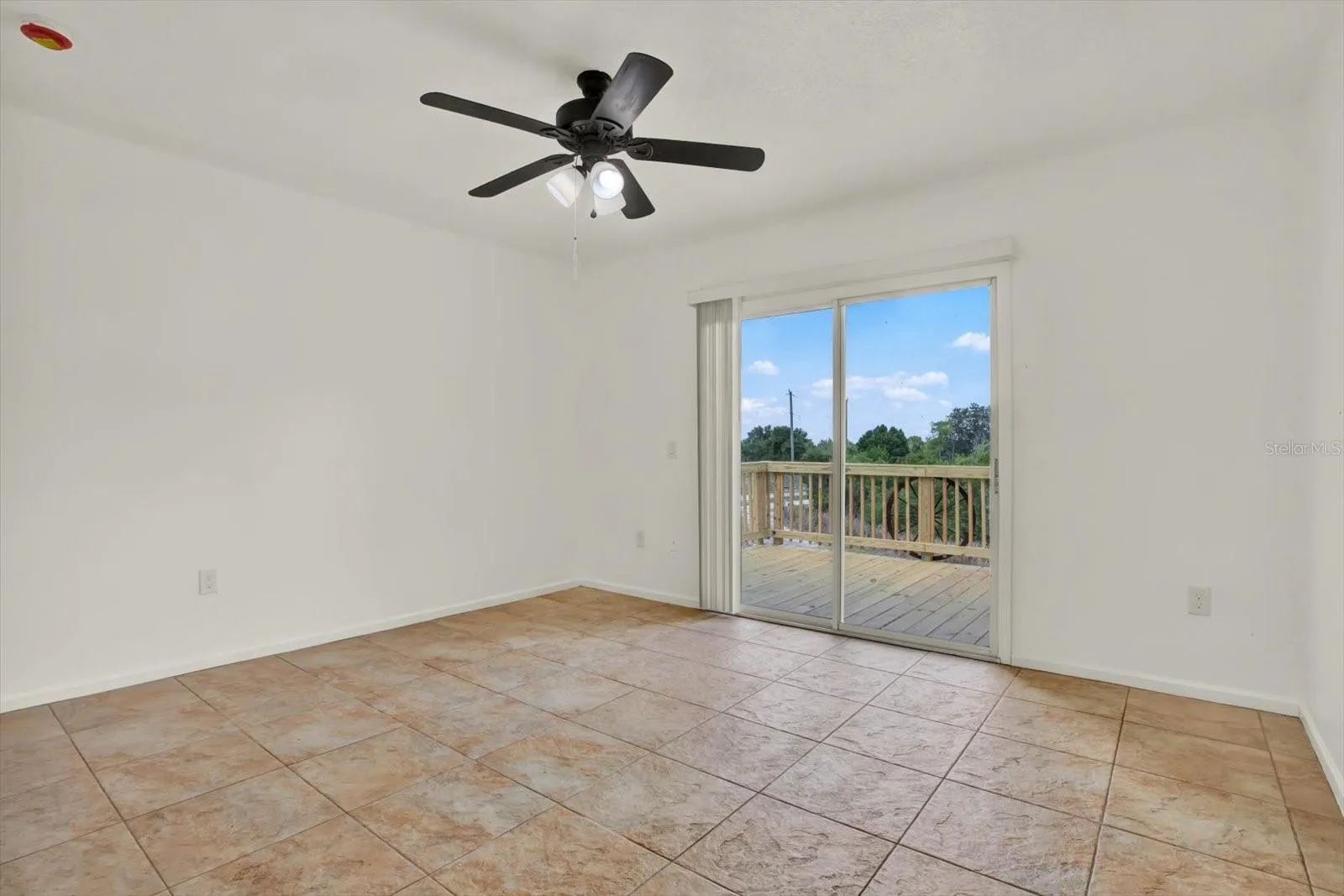 Master Bedroom with sliders to balcony