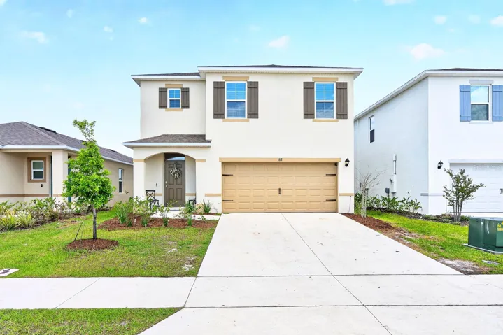 BUILT IN 2025 and offering the largest floor plan available in the desirable Magnolia Pointe community of Umatilla, this spacious 5-bedroom, 3-bath home is MOVE-IN READY now – no need to wait for new construction!