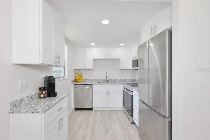 Stunning kitchen with some virtually staged items