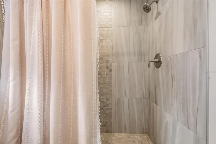 Large step in shower in primry bathroom