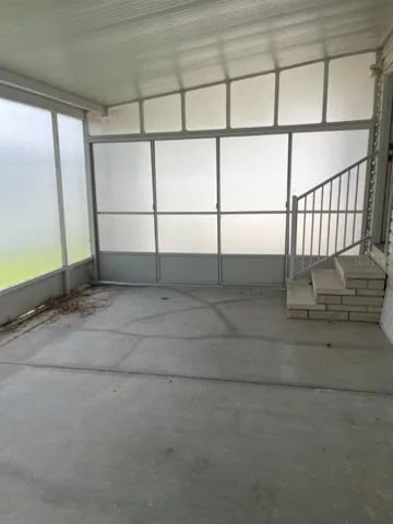 partially enclosed carport with Privacy screen