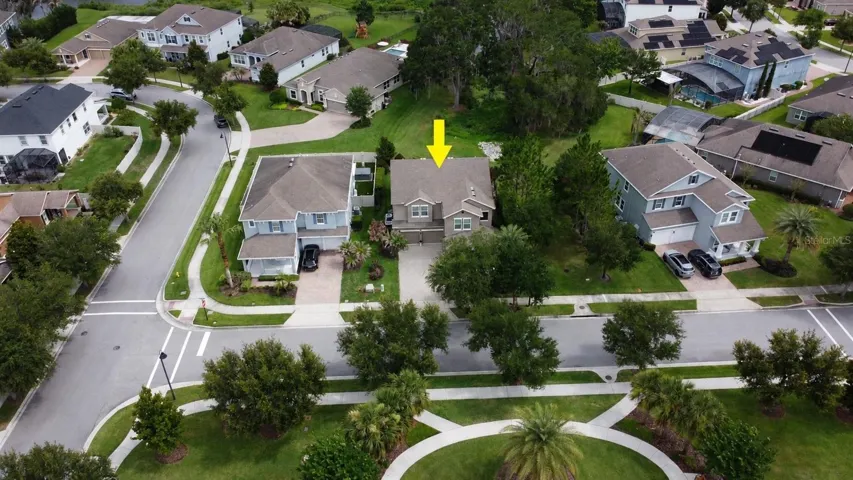Home is situated on a premium conservation lot adjacent to an inlet on Lake Burnett, with a green space tot he right and a park across the street.
