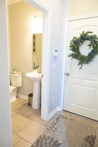 Easily access the garage through the door near the kitchen.