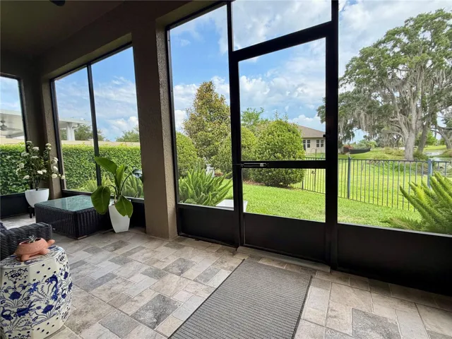 Beautifully landscaped backyard with aluminum fence, on a conservation lot.