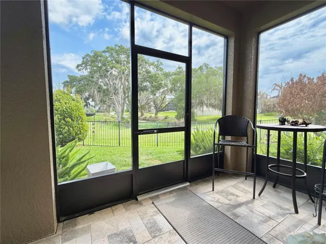 Breathtaking, tranquil views of Lake Burnett's natural beauty from the screened lanai and backyard.