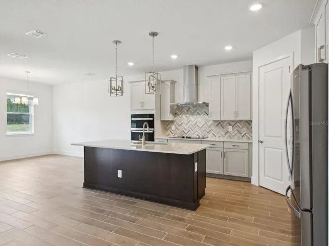 Photo is not of the actual home, but is an inspirational photo of builder’s model home and may depict options, furnishings, and/or decorator features that are not included.