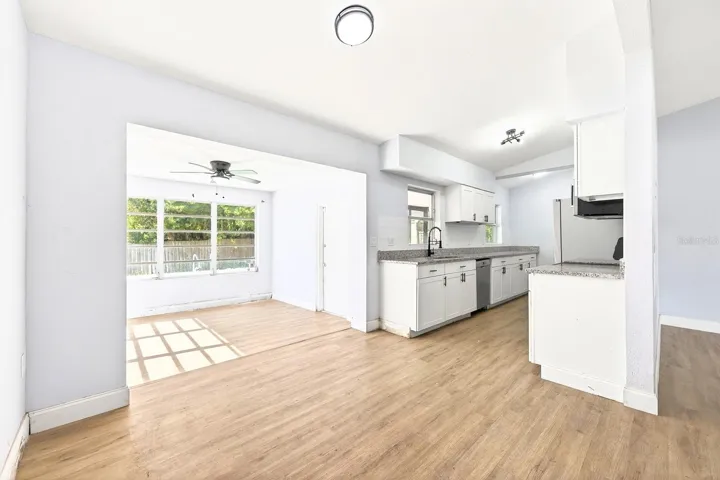 Dining area is open to the living room, kitchen, and Florida Room.