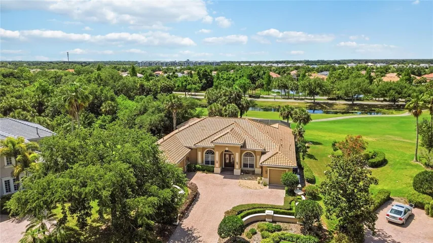Aerial view highlighting the diamond-shaped lot and rare side-to-side privacy.