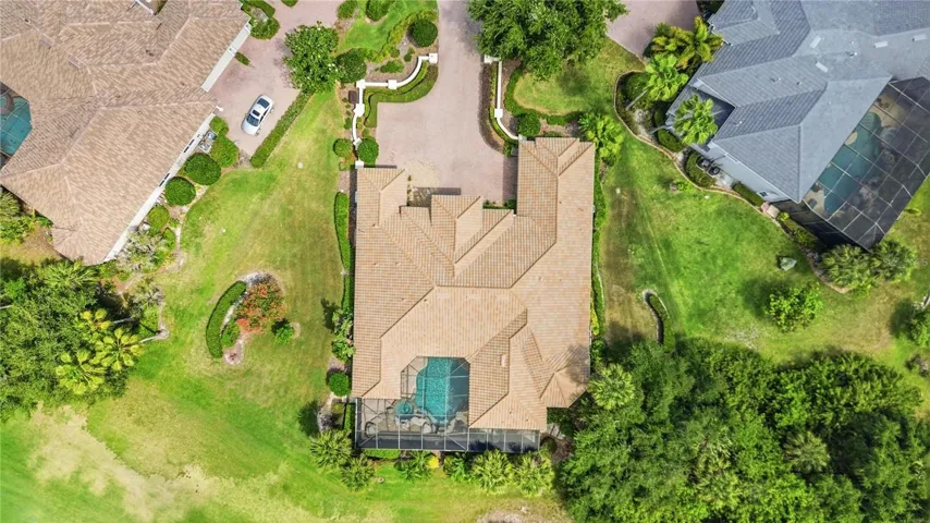 Top-down view showing the unique lot shape and exceptional privacy.
