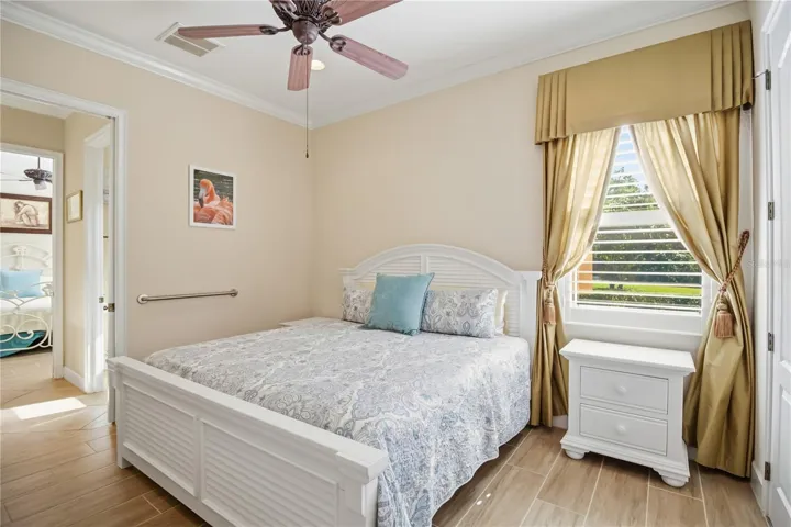 Bedroom with soft natural light and a calm, welcoming feel.
