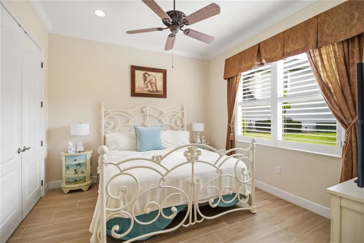 Guest bedroom with warm natural light and easy, comfortable style.