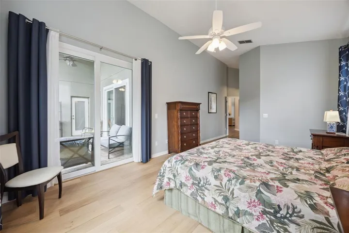 primary bedroom sliders out to Lanai