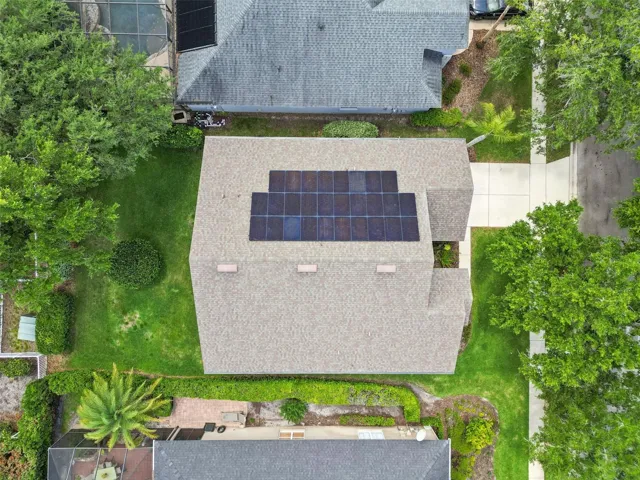 top of home with solar panels for electricity