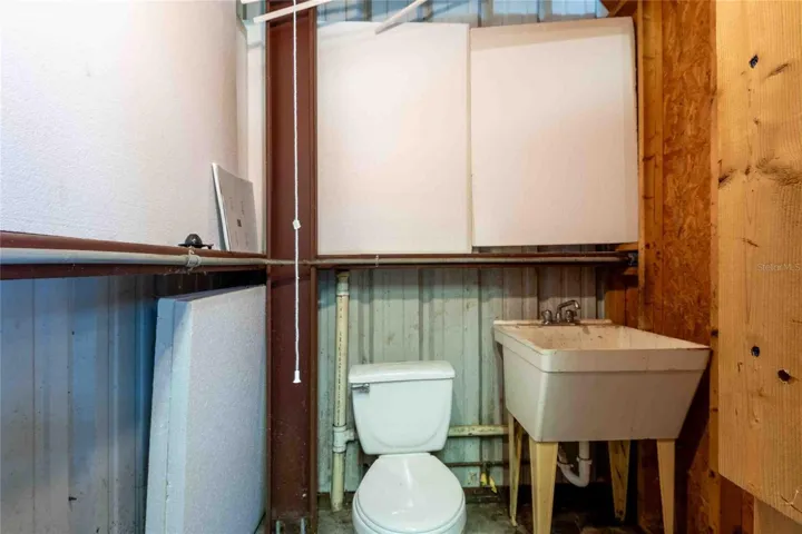 Bath in workshop with running water.