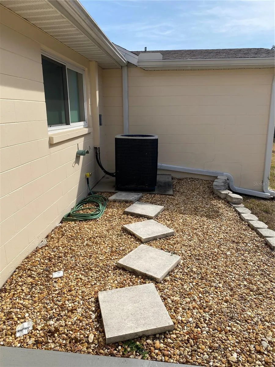 Backyard view of the AC unit.
