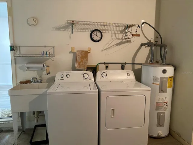 Washer &amp; dryer and water heater located in the garage