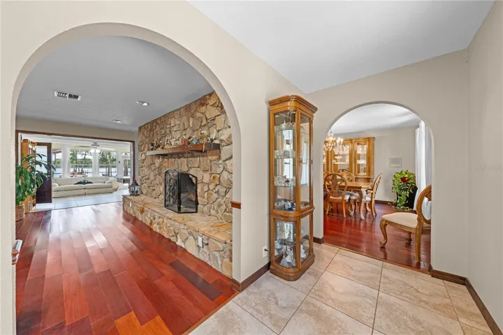 Foyer with view of living room and dining room