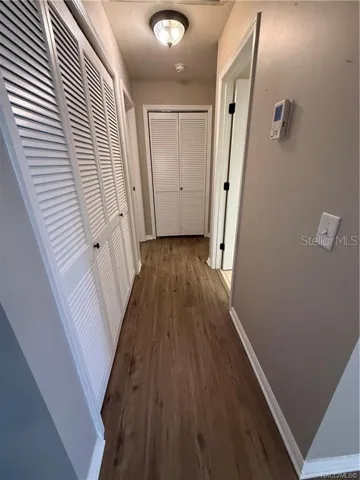 Hallway closet to bedrooms and bathroom