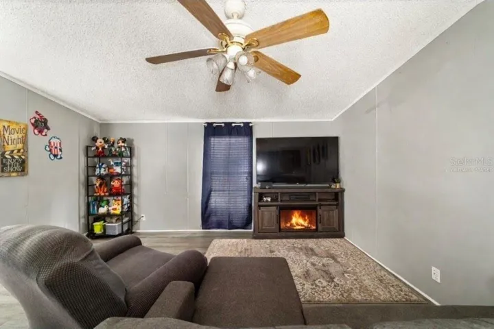 Freshly painted, Large ceiling fan. Virtually staged