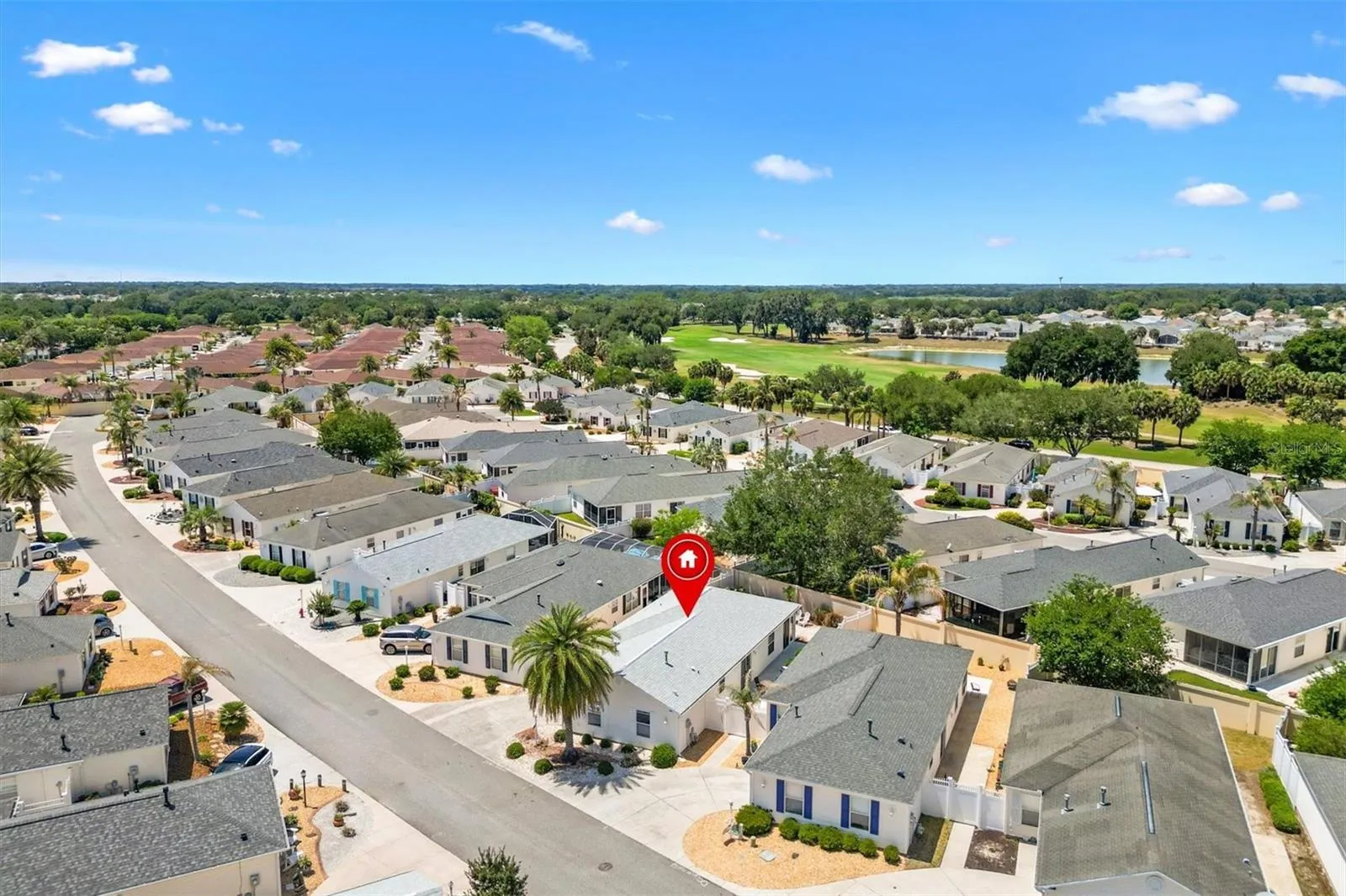 AERIAL VIEW OF HOME AND COMMUNITY