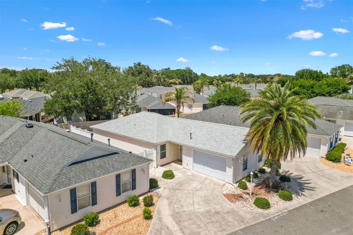 AERIAL VIEW OF FRONT GARAGE &amp; FRONT ENTRY