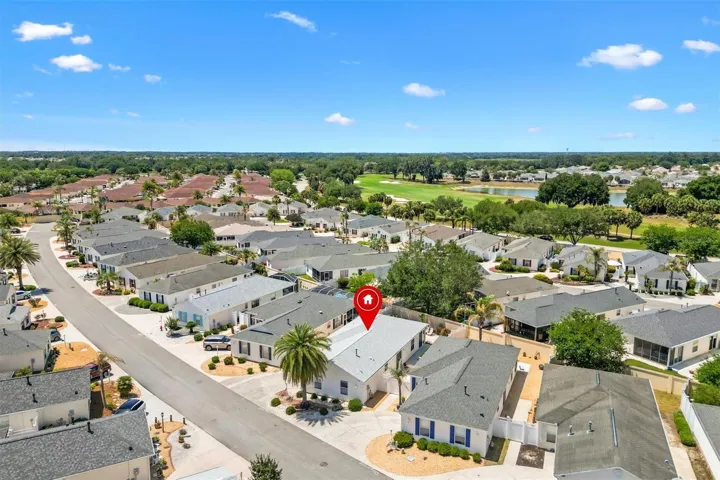 AERIAL VIEW OF HOME AND COMMUNITY