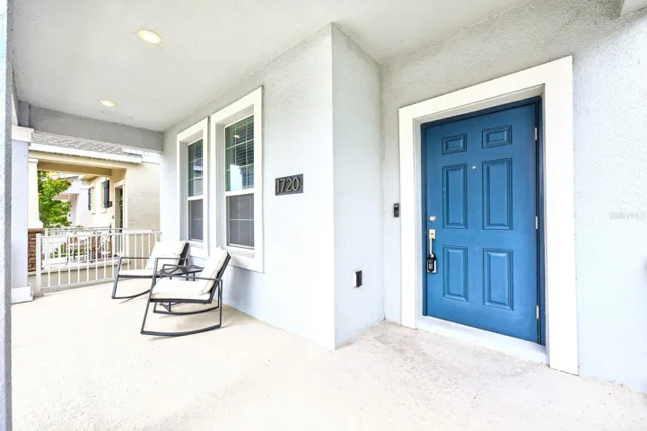 From the moment you arrive, the paver walkway and CHARMING FRONT PORCH create an inviting first impression.