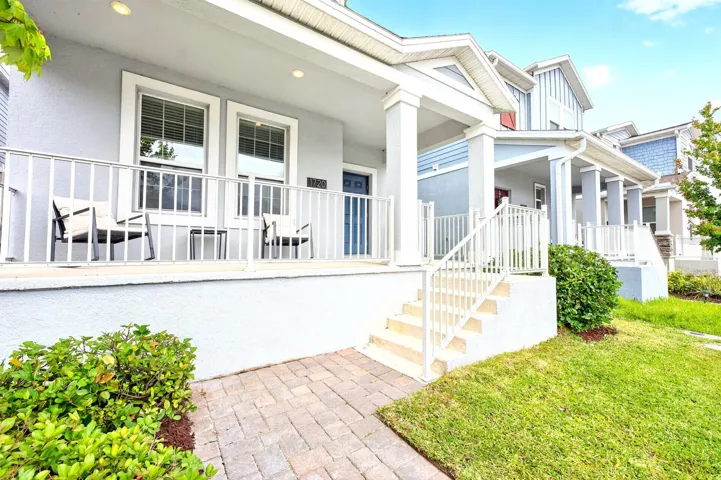 From the moment you arrive, the paver walkway and CHARMING FRONT PORCH create an inviting first impression.