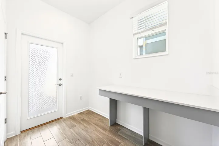 The dedicated mudroom offers the perfect, organized transition from the garage.