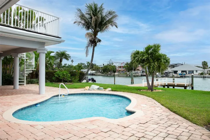 Cool off out back in your crisp pool & patio