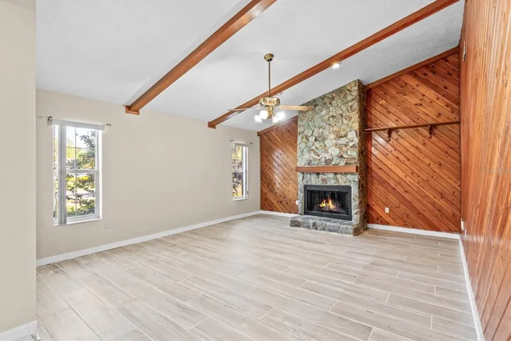 Living room with wood-burning fireplace adds warmth and character.