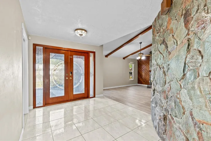Double door entry offers a spacious, inviting entrance