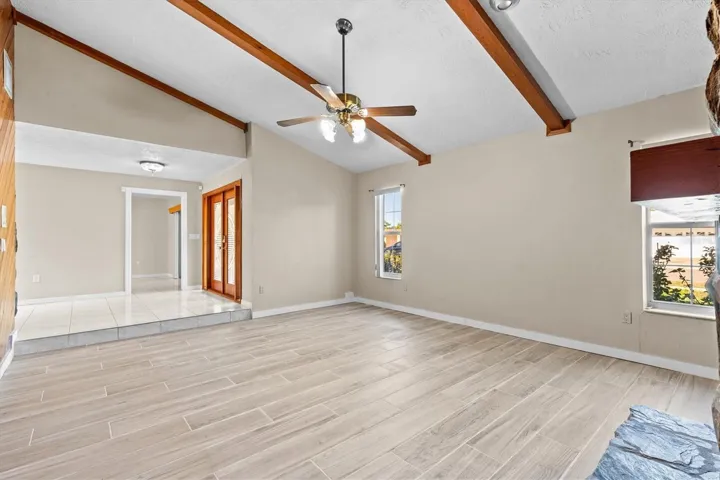 Vaulted ceilings create a bright, spacious living area.