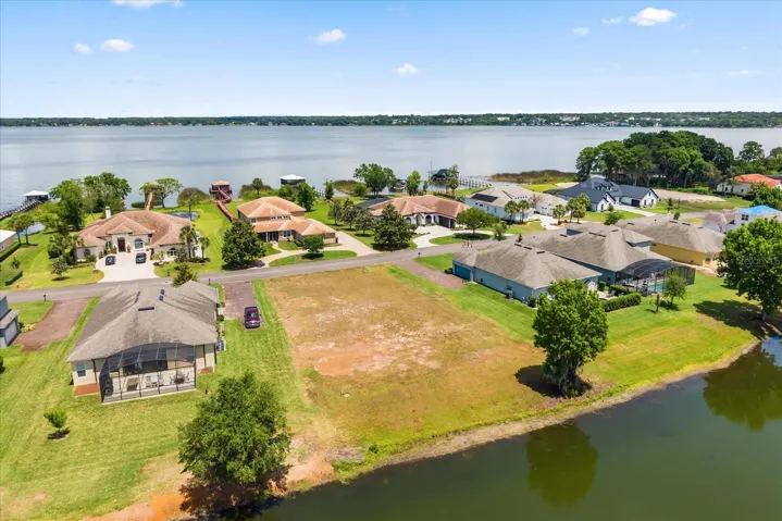 From back (over pond) with Lake Dora in view