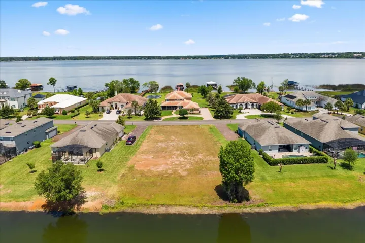 From back (over pond) with Lake Dora in view