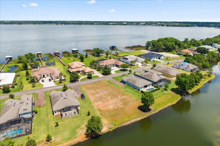 From back (over pond) with Lake Dora in view