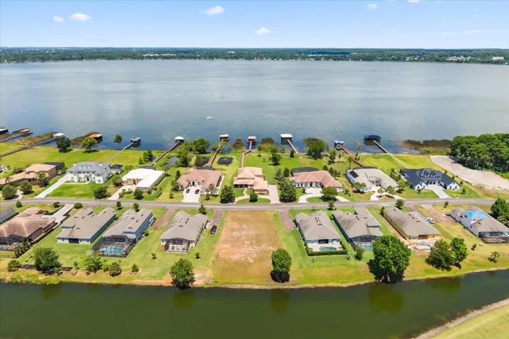 From back (over golf course) with Lake Dora in view
