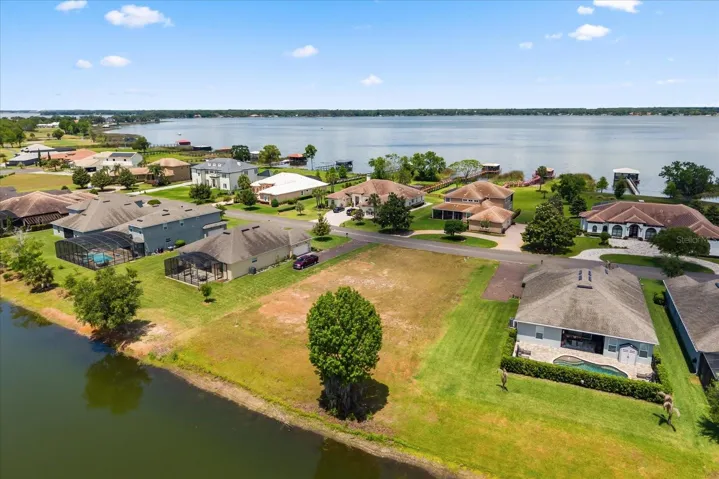 From back (over pond) with Lake Dora in view
