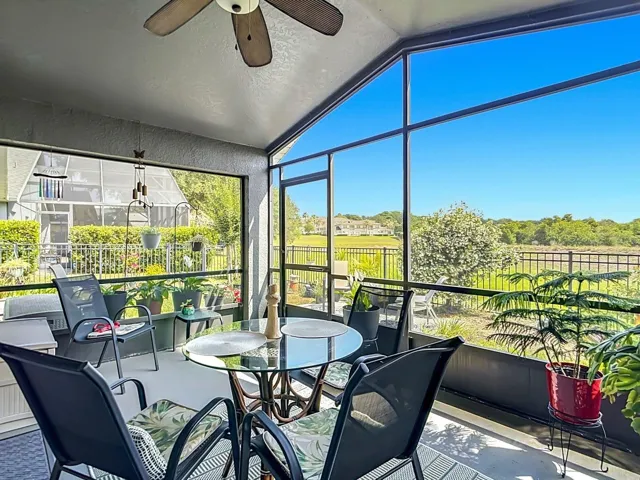 Enjoy a breath of nature in your screened-in back porch.