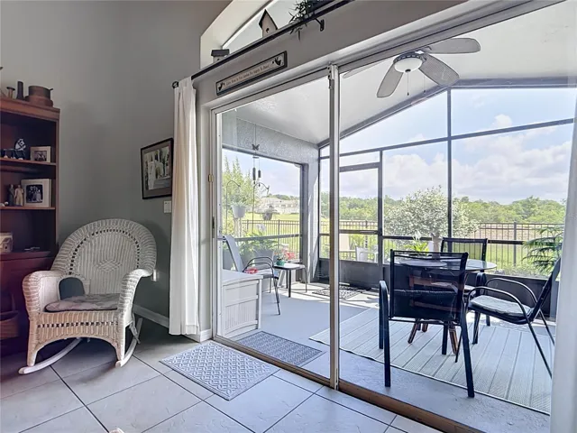 Enjoy views of the back yard and spacious covered & screened porch from the family room.