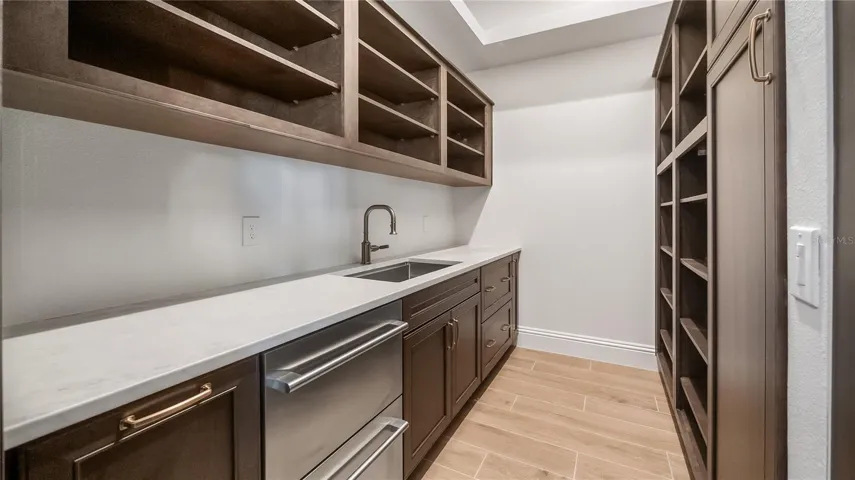 Hidden pantry with additional freezer drawers
