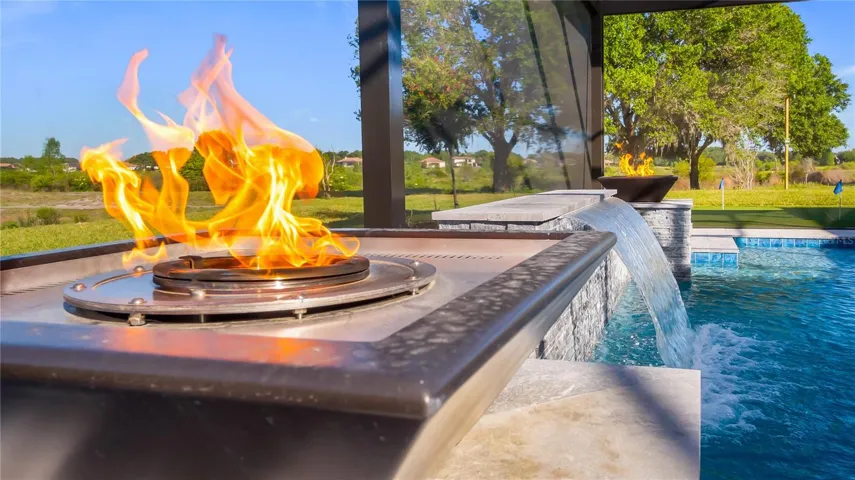 Fire bowls and pool waterfall