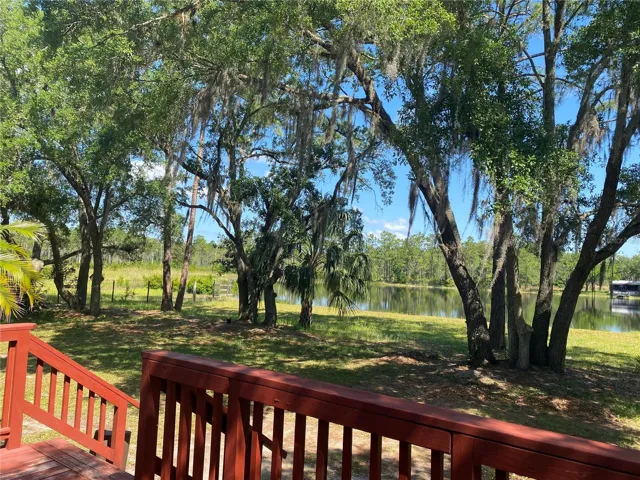 Relax and enjoy 165' of lakefront